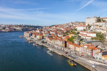 Fototapeta na wymiar The typical colorful buildings of the Ribeira in Porto, Portugal