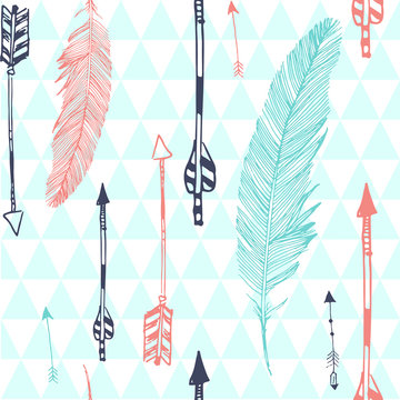 Seamless pattern with feather and arrows