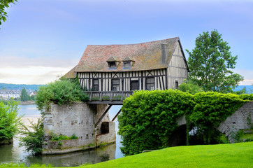 Fototapeta na wymiar Old mill house on bridge, Seine river, Vernon, Normandy, France