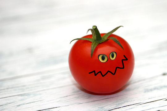 b&ouml;se rote Tomate
