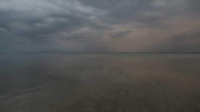 city view from edge of bay during low tide	