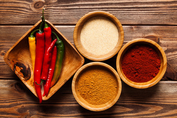 Assortment of spices on a wooden table