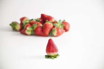 stil life of organic strawberries grouped