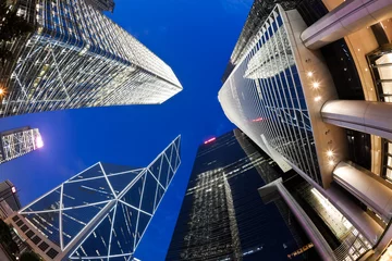 Tuinposter Fisheye view of skyscrapers in Hong Kong © ymgerman