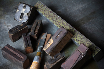 Old wooden printing press letters