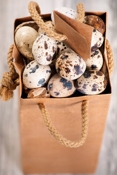 Brown pack with quail eggs