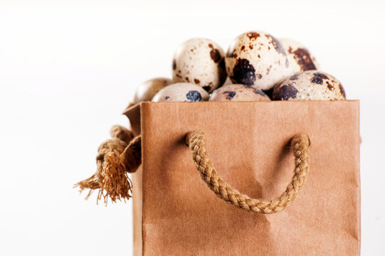 Brown pack with quail eggs