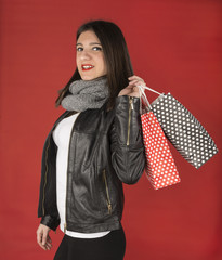 Young girl with shopping bags