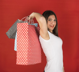 Young girl with shopping bags