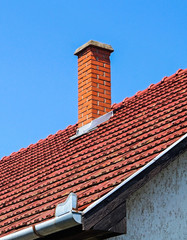 House roof with smoke stack