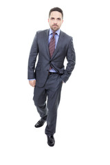 Friendly and smiling businessman looking at camera with