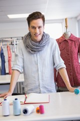 Obraz premium Smiling student posing in classroom