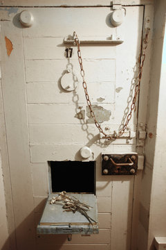 Close up view of prison bar's door