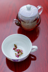 kettle and a cup of tea roses