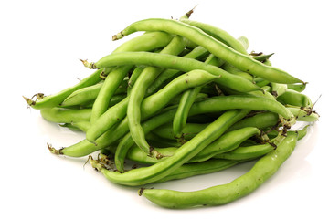 bunch of broad beans on a white background