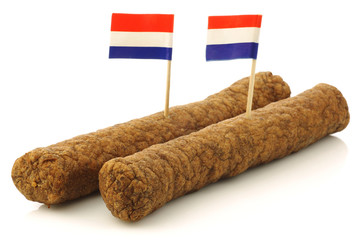 Two Dutch snacks called "fricandel" with Dutch flag