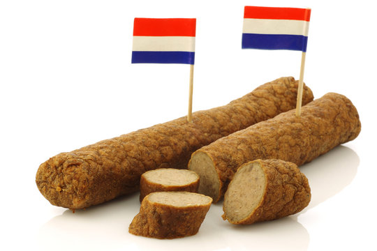Two Dutch snacks called "fricandel" with Dutch flag
