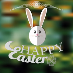 Bunny shaped Easter egg on green background