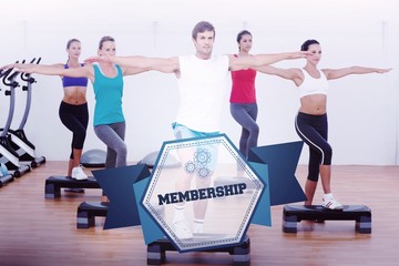 Naklejka premium The word membership and fitness class performing step aerobics