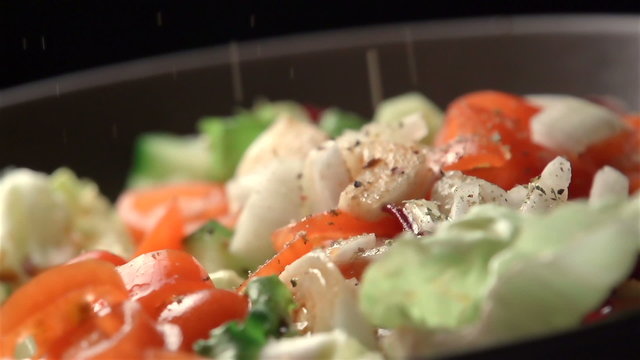 Slow motion of salad. Find similar in our portfolio.