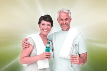 Obraz premium Composite image of portrait of a happy fit couple