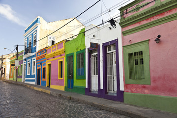 Cobbled street in historic city Olinda with colourful houses