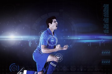 Fototapeta na wymiar Composite image of cheering football player