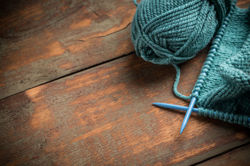 Woollen thread and knitting needle