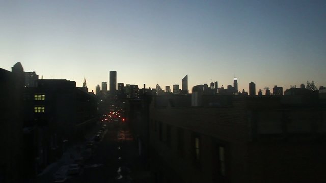 Manhattan skyline at sunset. View from the metro / train.
