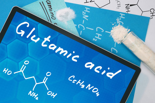 Tablet with the chemical formula of  Glutamic acid .