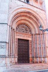 A portal of the Baptistery of Parma, built with pink marble