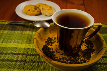 tea with coockies on wooden table