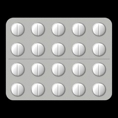 Packed colorful pills in foil on background