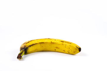 Overripe banana isolated on white - obrazy, fototapety, plakaty