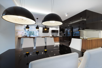 Modern kitchen interior design with black table