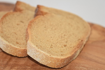 A slice of bread on a chopping board.