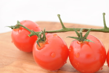 Cherry tomatoes. Ripe red mini tomatoes.