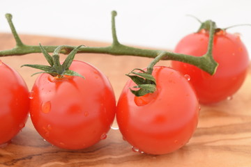 Cherry tomatoes. Ripe red mini tomatoes.