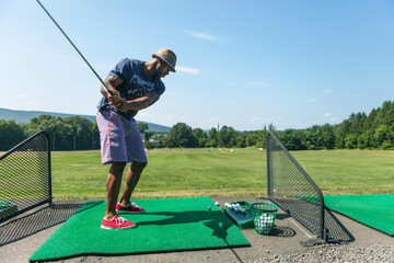 Golf Practice at the Driving Range - 78511328