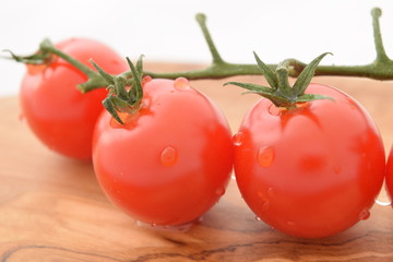 Cherry tomatoes. Ripe red mini tomatoes.