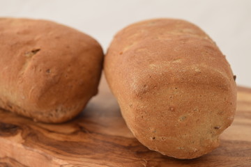 A slice of bread on a chopping board.