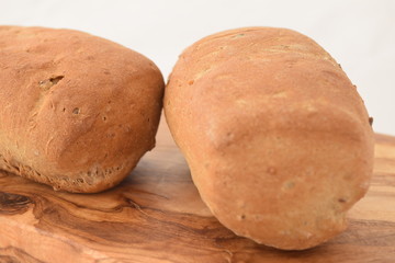 A slice of bread on a chopping board.