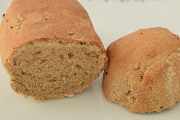 A slice of bread on a chopping board.