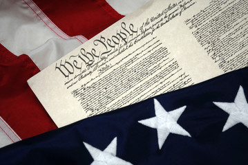We The People - U.S. Constitution document and flag