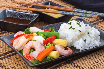Shrimp stir fry with vegetables and rice