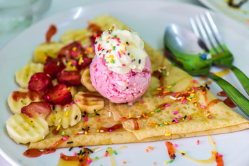 Chocolate pancakes with banana