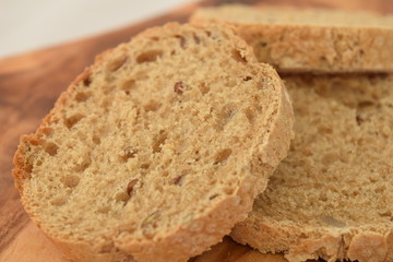 A slice of bread on a chopping board.