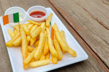 French fries on wood table