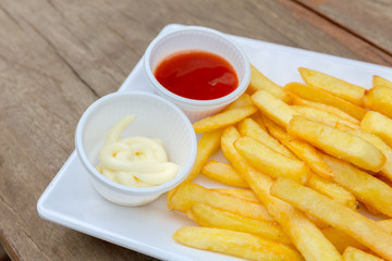 French fries on wood table