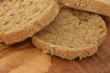 A slice of bread on a chopping board.